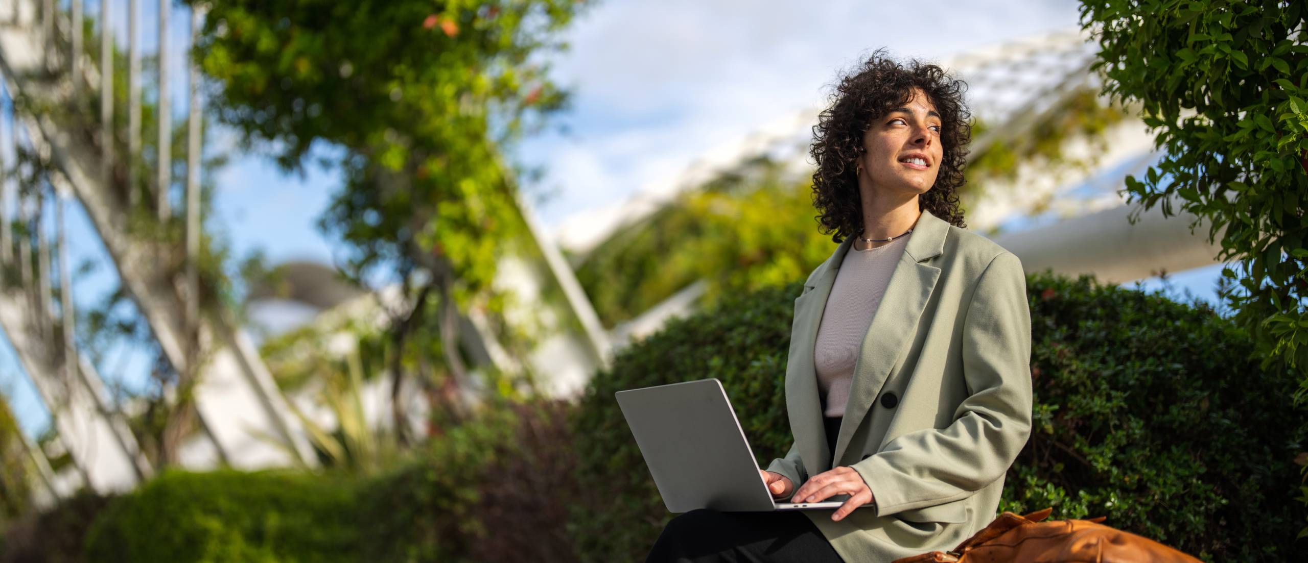 A woman takes a break from checking her email.
